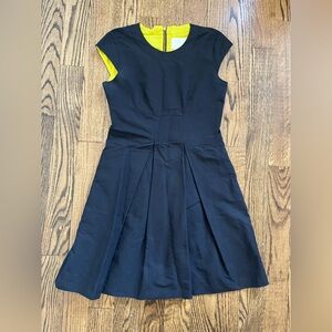 Vintage Kate Spade fit and flair midi dress with bow detail and yellow lining. 8